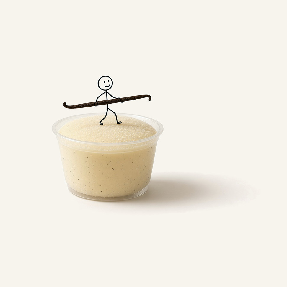 Vanilla snow ice block in a clear cup, with a line-drawn figure on top